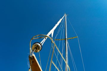 Photo of sailboat rigging. Photo credit John Bridgewater via Upsplash.